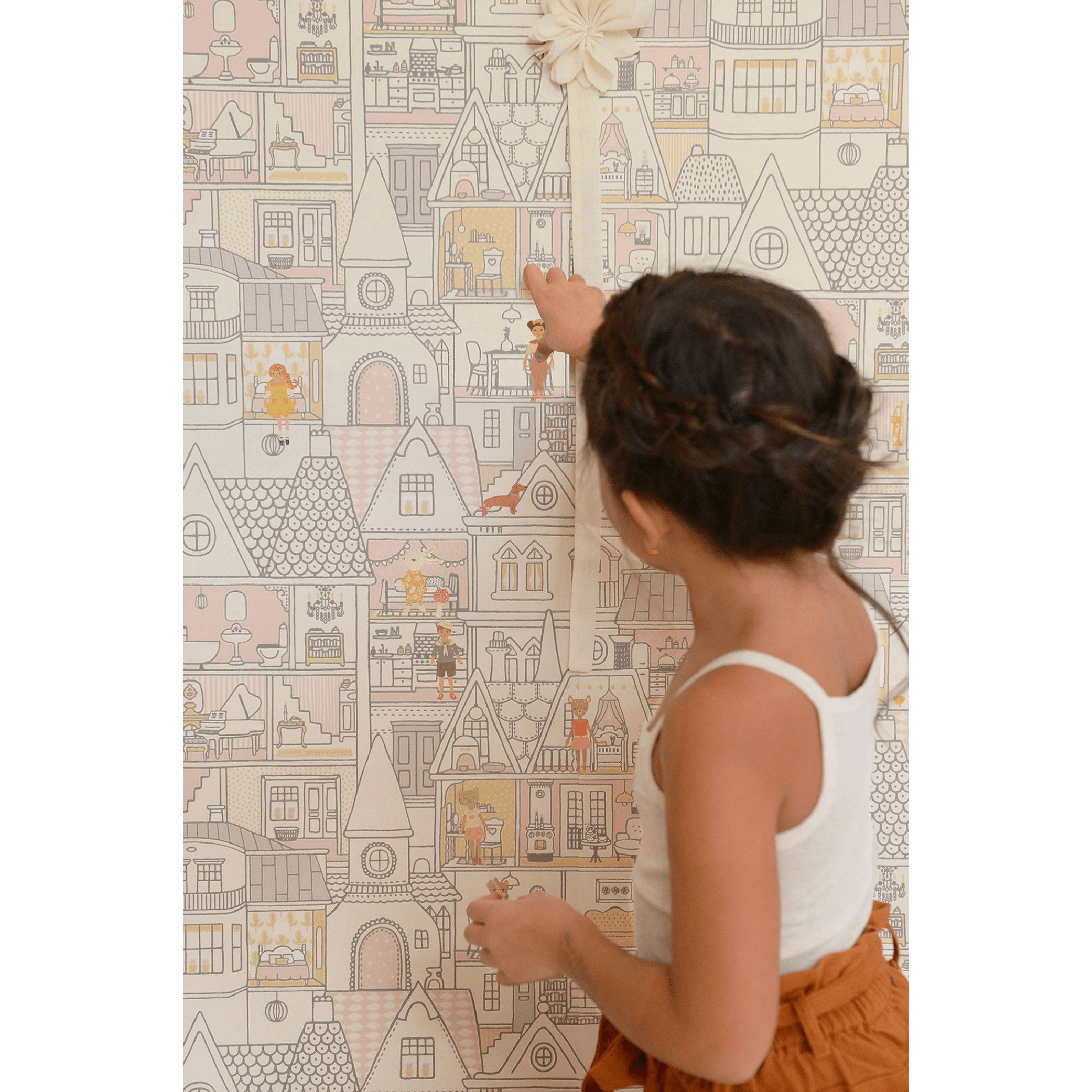 Majvillan Wall Stickers 801-01 girl putting stickers on wallpaper