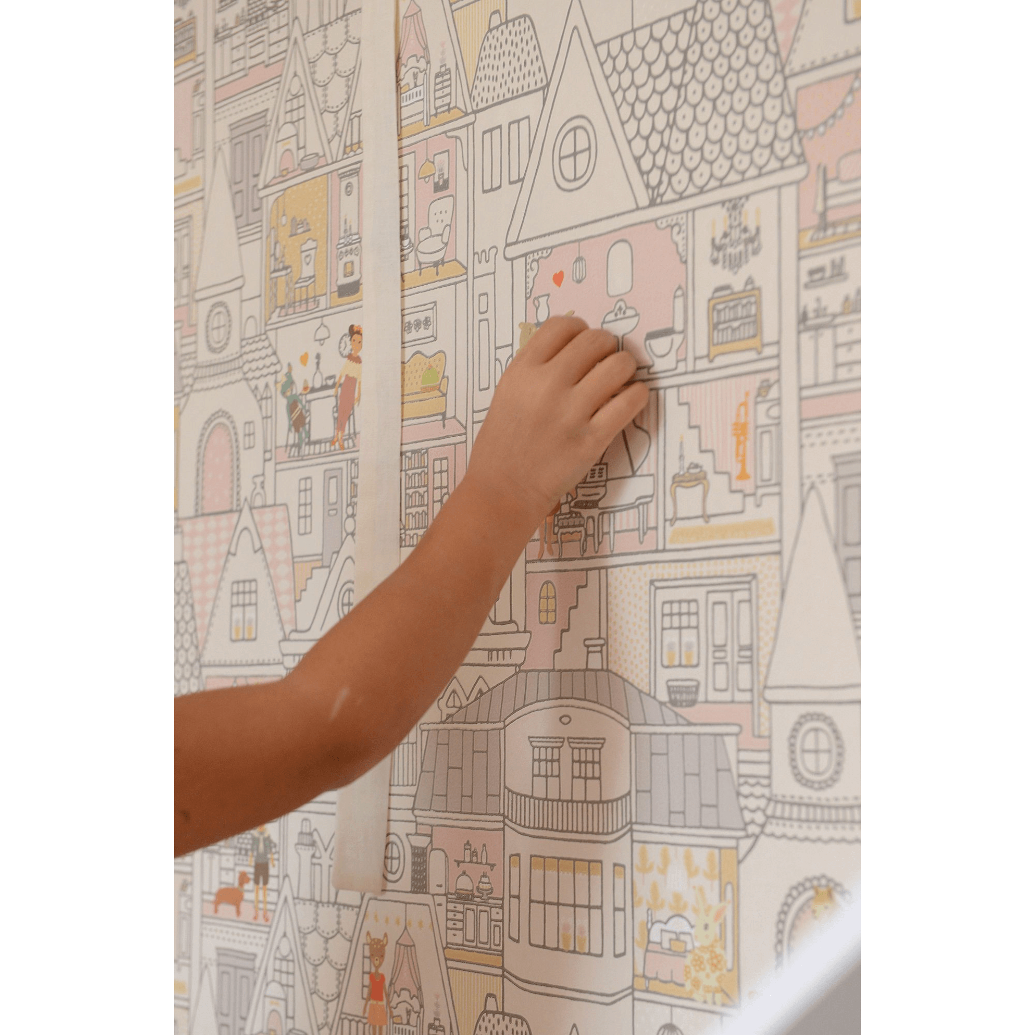 Majvillan Dollhouse Wallpaper 147-01 hand putting stickers on wallpaper