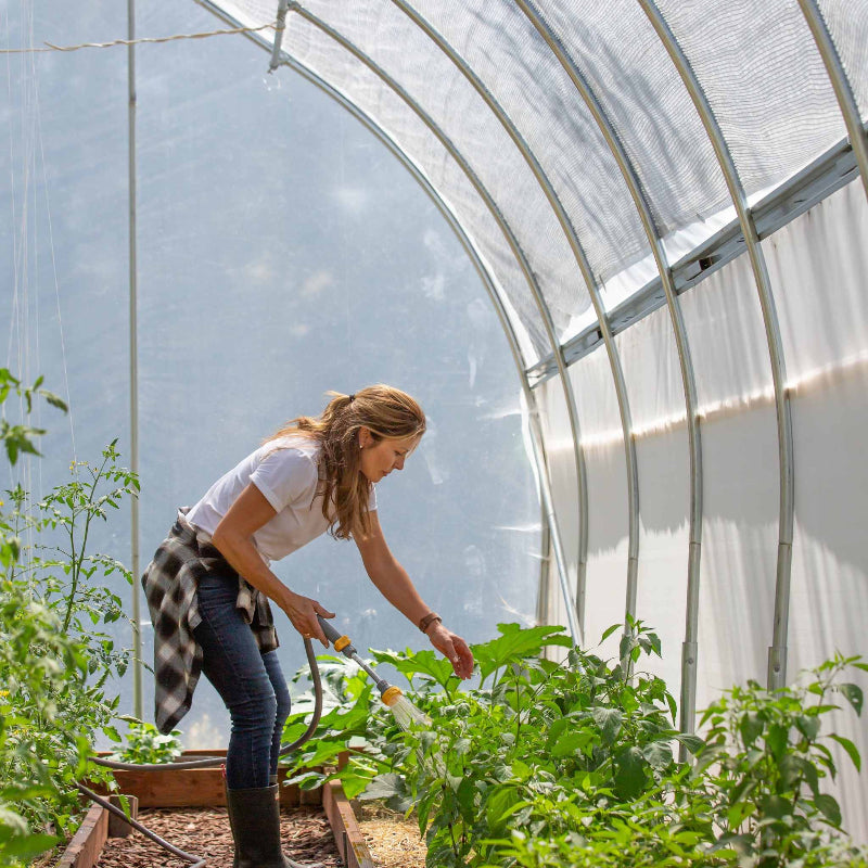Bootstrap Famer Gothic High Tunnel Greenhouse Girl Watering