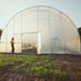 Bootstrap Farmer 30' Round All-Metal Hoop House Kit With Girl In Front
