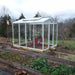 Janco Palmetto Greenhouse with outside garden