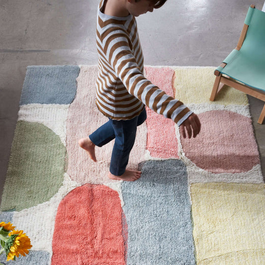 Lorena Canals Woolable Rug Abstract WO-ABSTRA-L child standing on rug