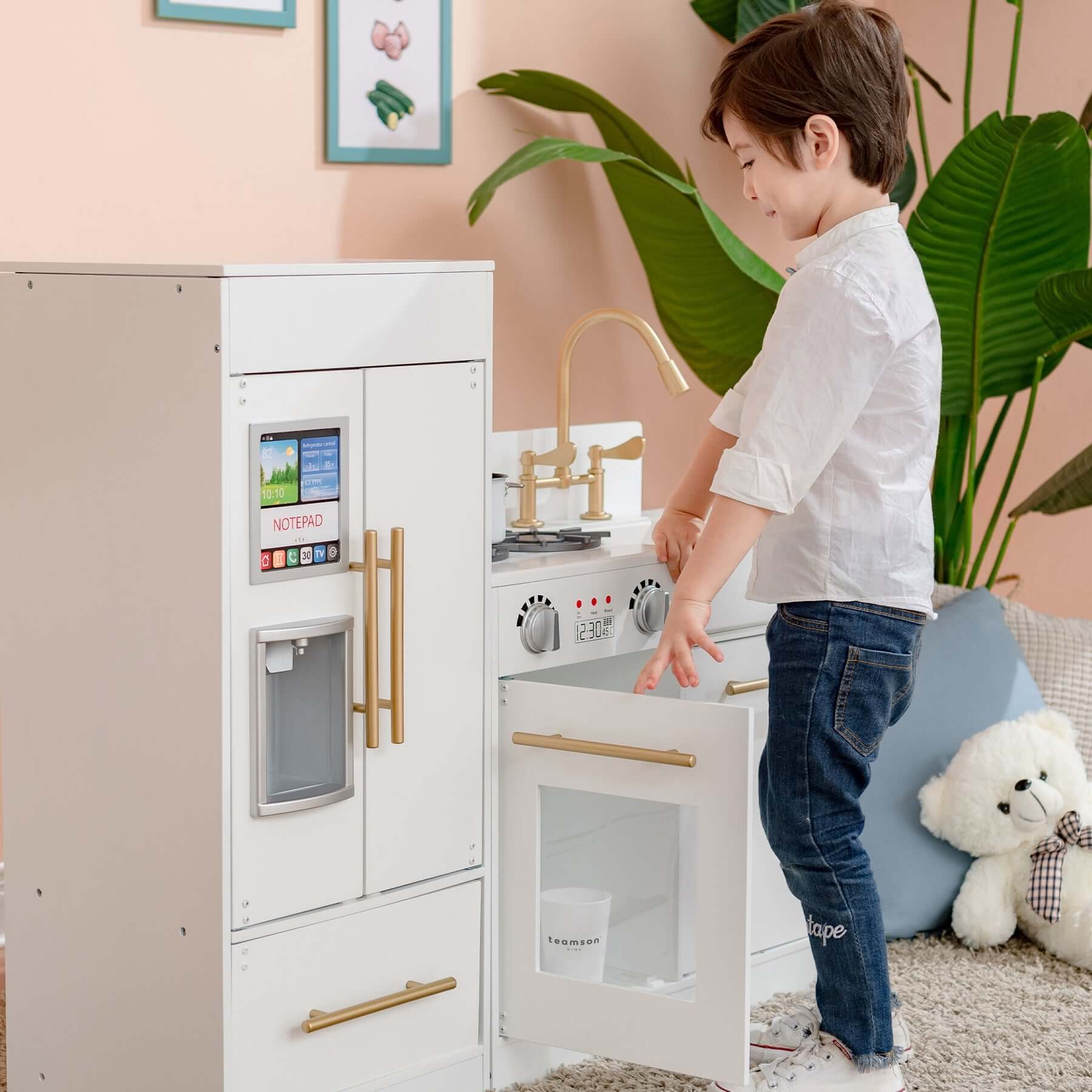 Teamson Kids Little Chef Charlotte Modern Play Kitchen, White/Gold TD-12302WR child playing close up